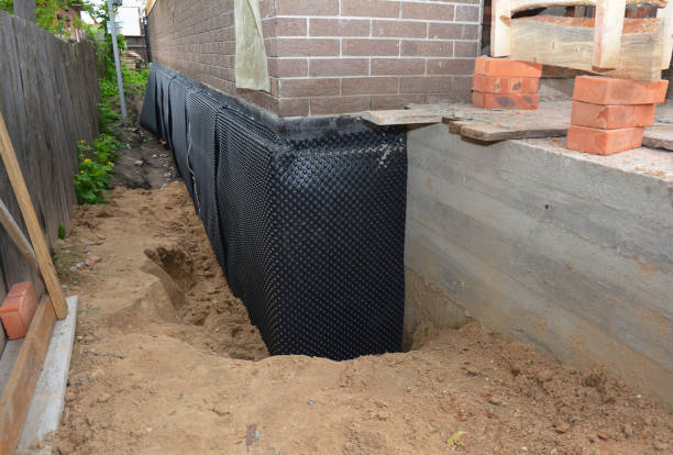 Happy homeowners after waterproofing job in Fort Loramie